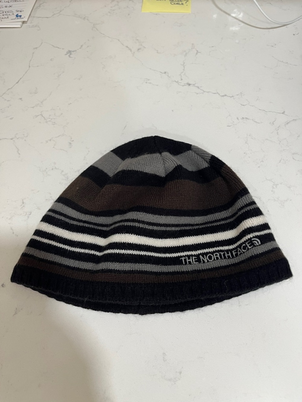 The North Face Striped Knit Beanie in Black, Brown & Gray